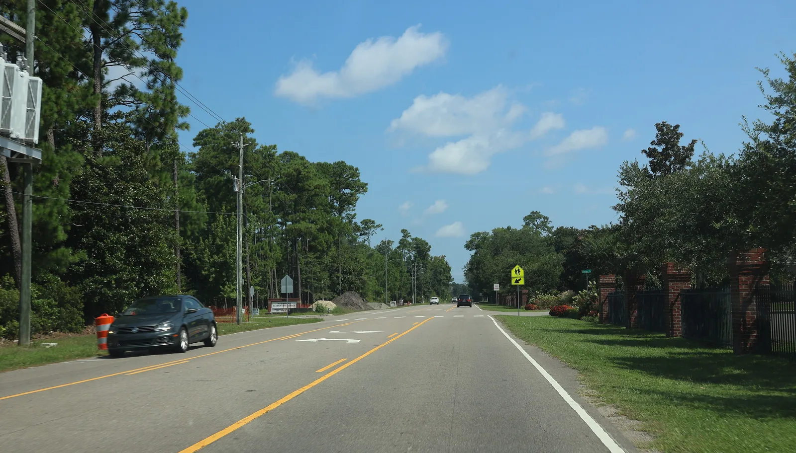Masonboro Loop Road, a two-lane road lined with trees, in Wilmington.