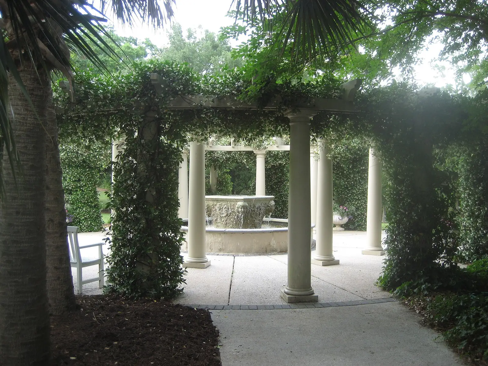 Columns and a fountain wrapped in jasmine at Airlie Gardens in Wilmington.